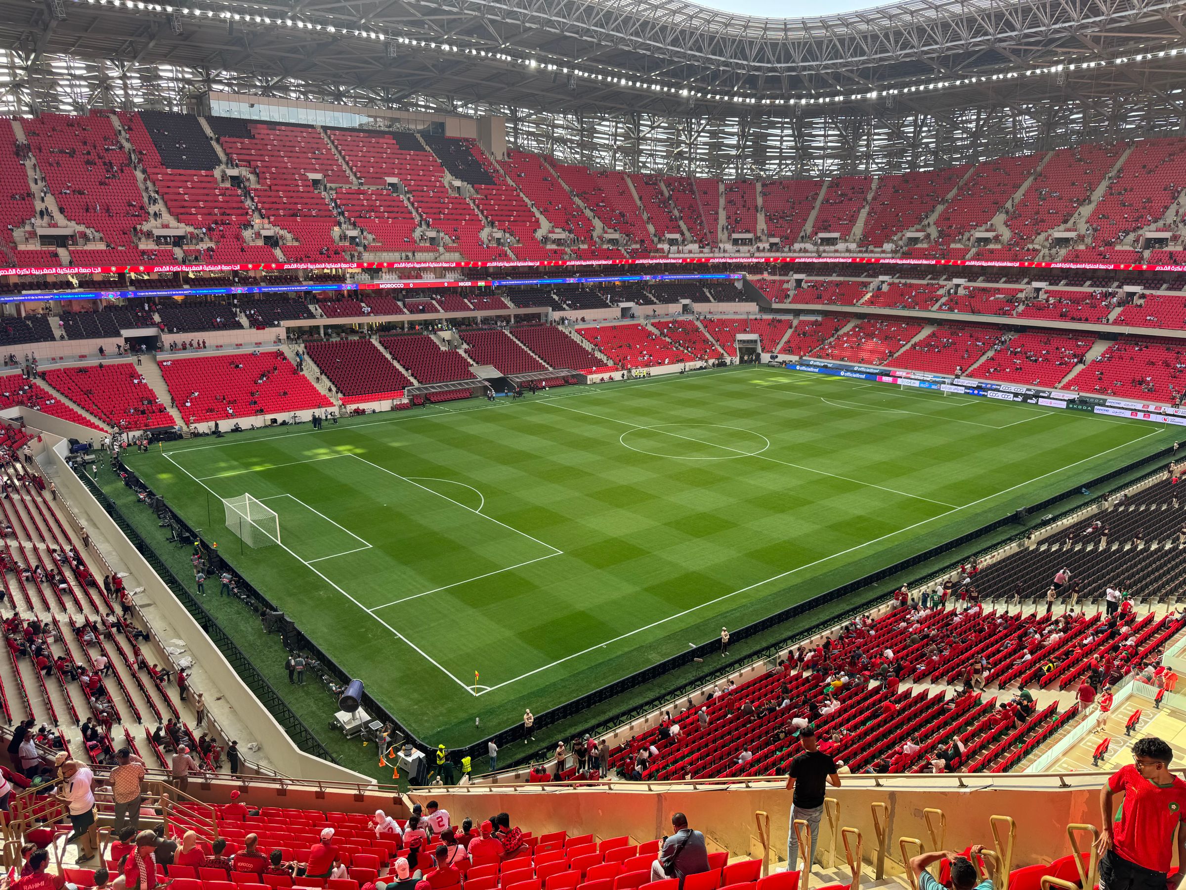 The stands and pitch of a modern stadium in Rabat
